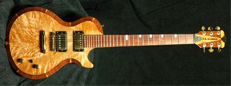 Custom 6 string guitar with Maple top by Peter Occhineri paocchineri@comcast.net USA